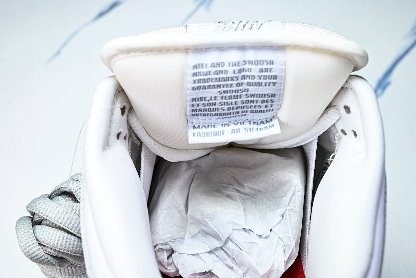 SB Dnk Low x Supreme 94 White Metallic Silver