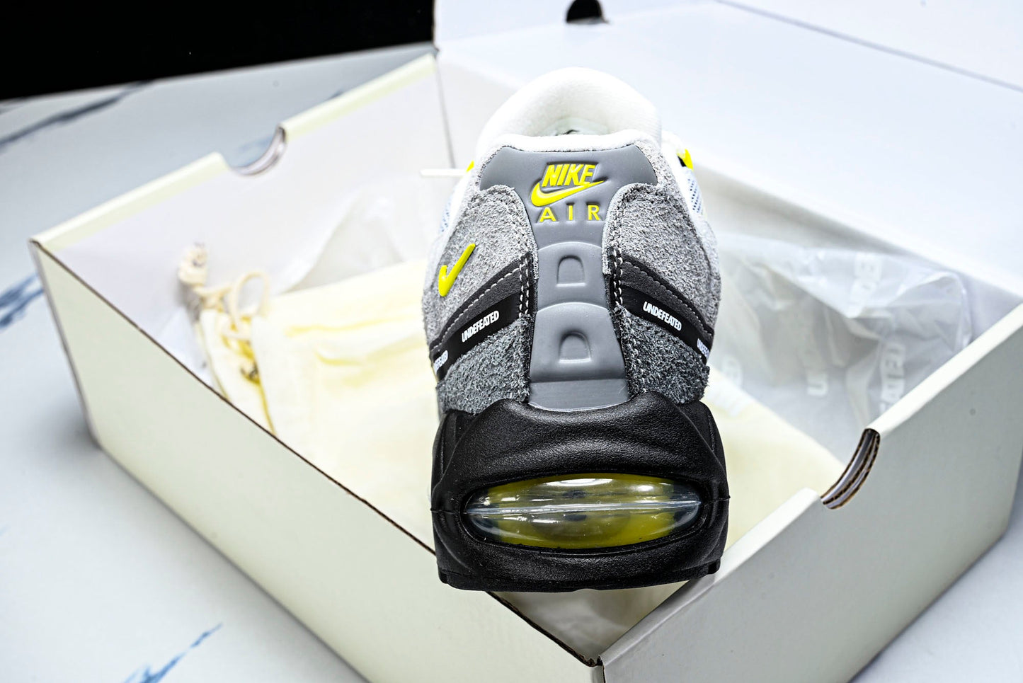 Undefeated x AM95 Geo Exclusive Pack 'Shanghai Opti Yellow'