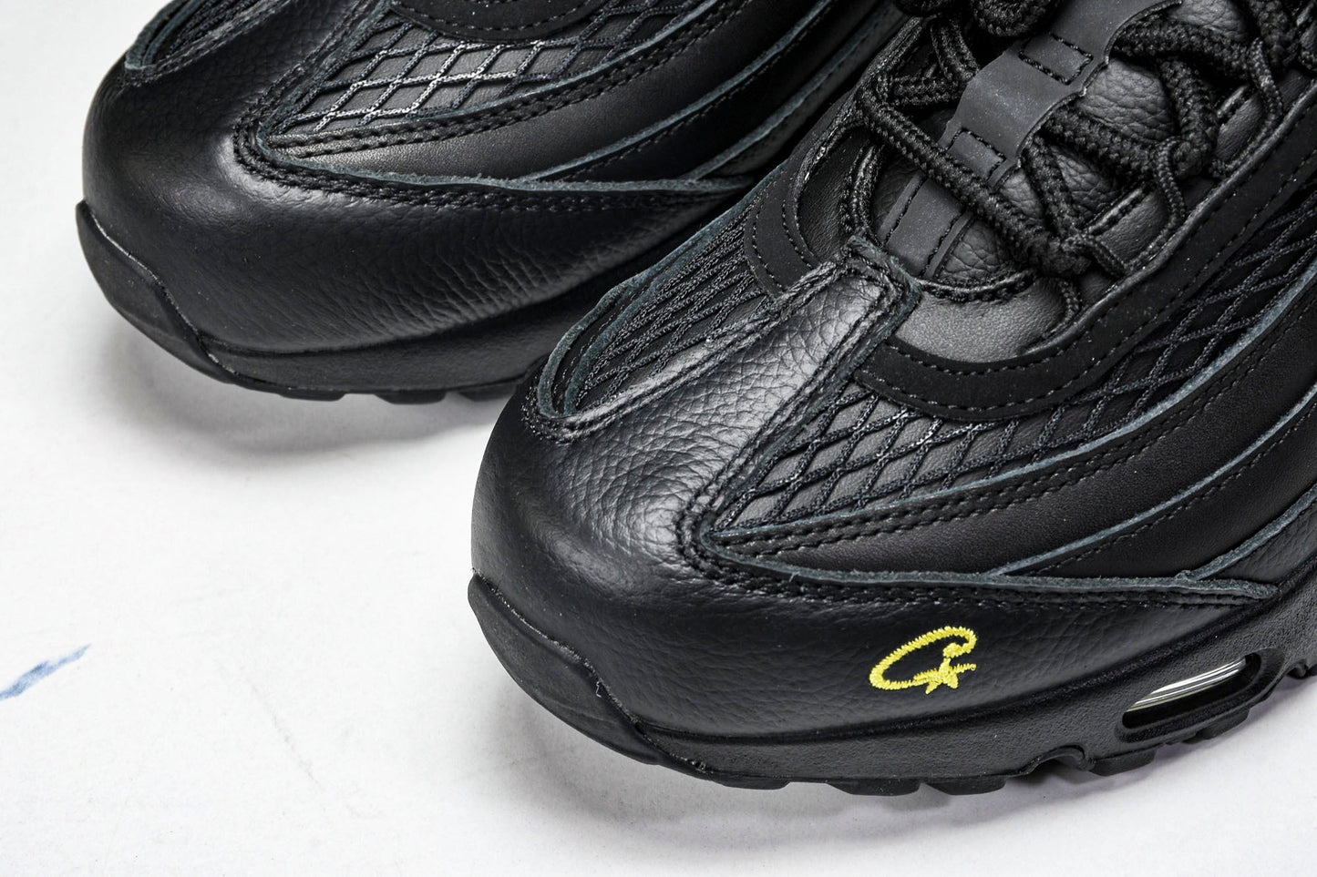 Corteiz x AM95 'Honey Black'