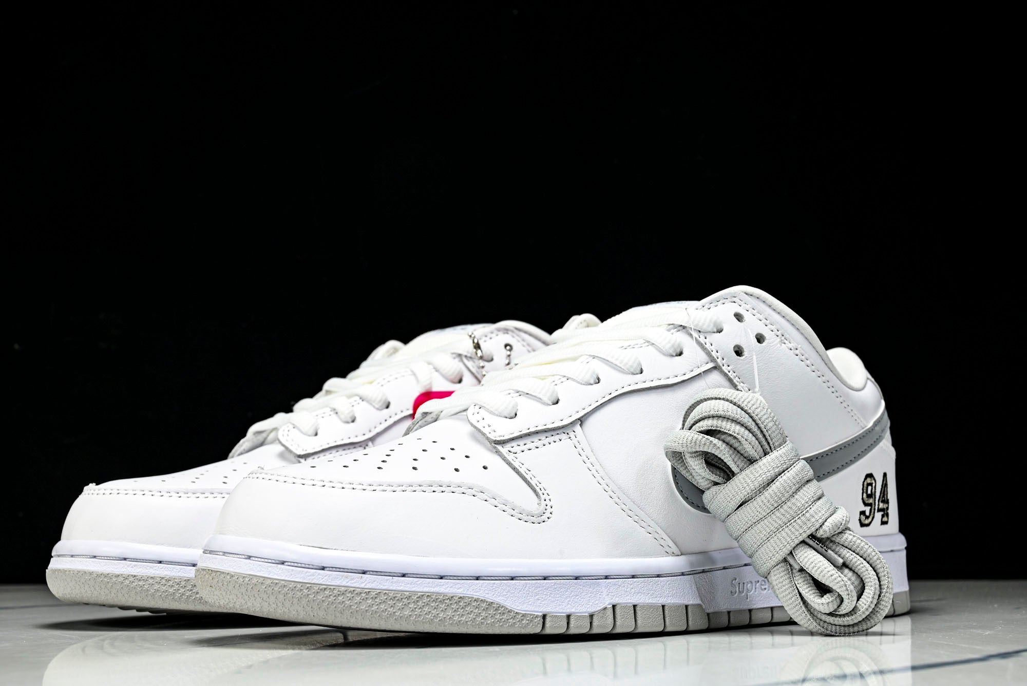 SB Dnk Low x Supreme 94 White Metallic Silver