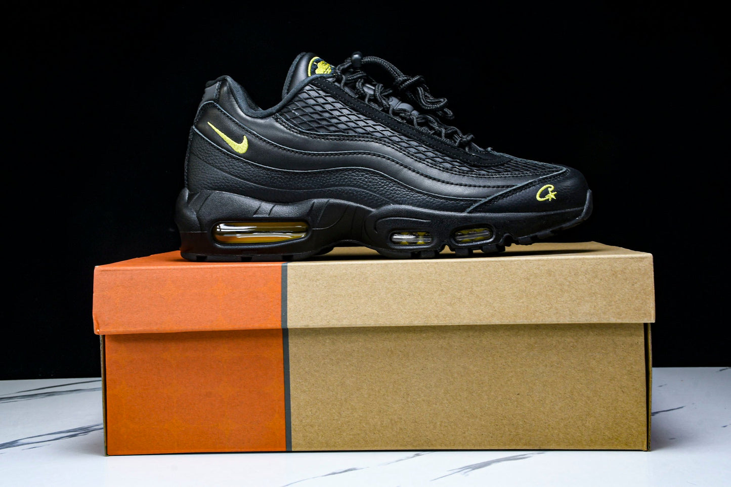 Corteiz x AM95 'Honey Black'