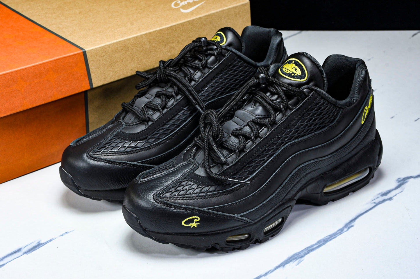 Corteiz x AM95 'Honey Black'