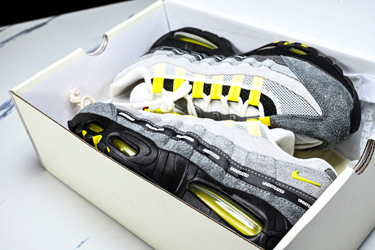 Undefeated x AM95 Geo Exclusive Pack 'Shanghai Opti Yellow'