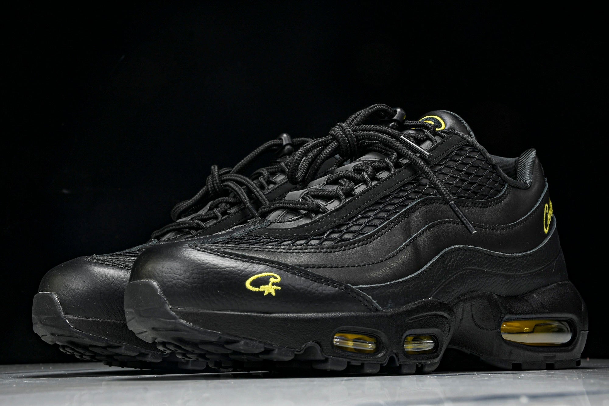 Corteiz x AM95 'Honey Black'