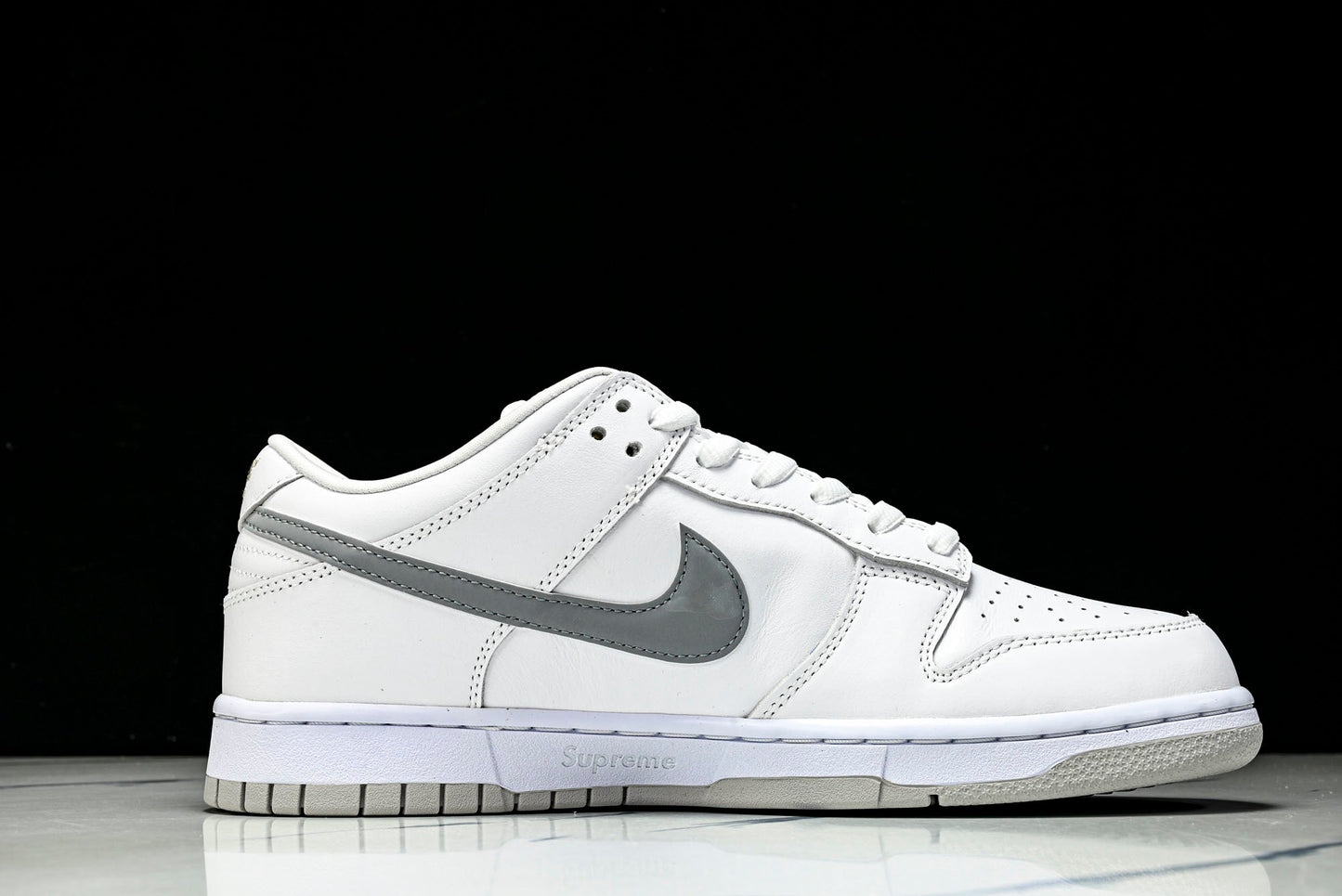 SB Dnk Low x Supreme 94 White Metallic Silver