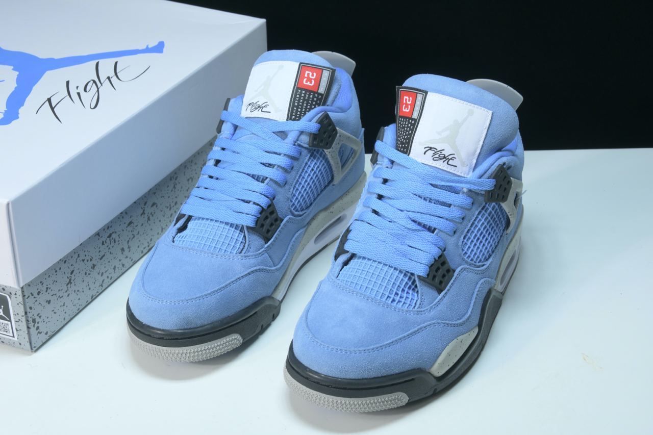 university blue jordan 4 foot locker